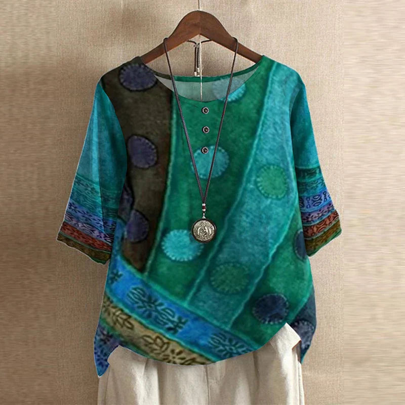 Vintage-style women’s blouse presented unworn against a clean background for timeless elegance.