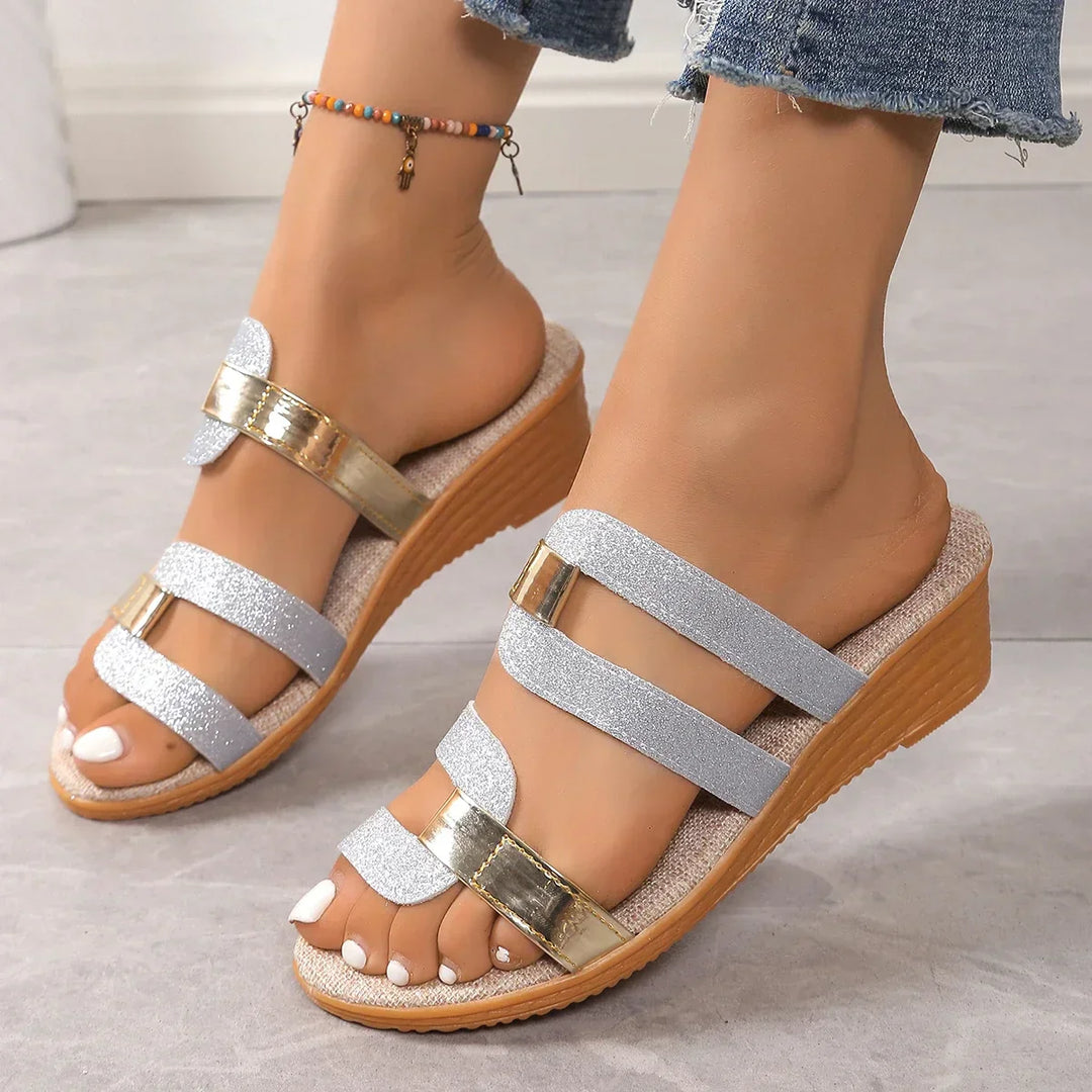Stylish women’s braided sandals displayed on a female model with a minimal background.