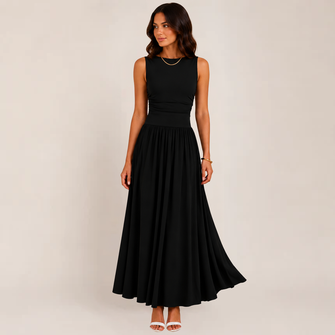 Model wearing a ruched sleeveless maxi dress on a plain background.
