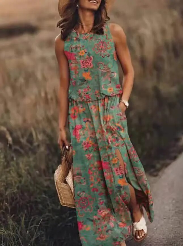 Female model showcasing a flowing summer maxi dress against a plain background.
