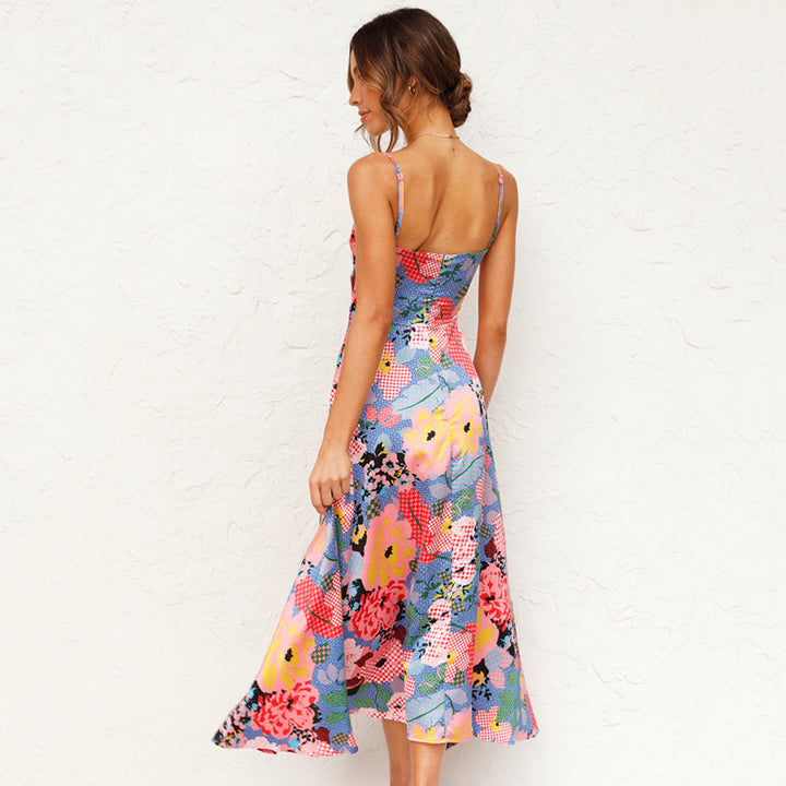 Woman wearing flowy summer dress plain background