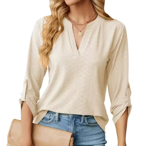 Soft breathable blouse styled on a wearer against a plain background.