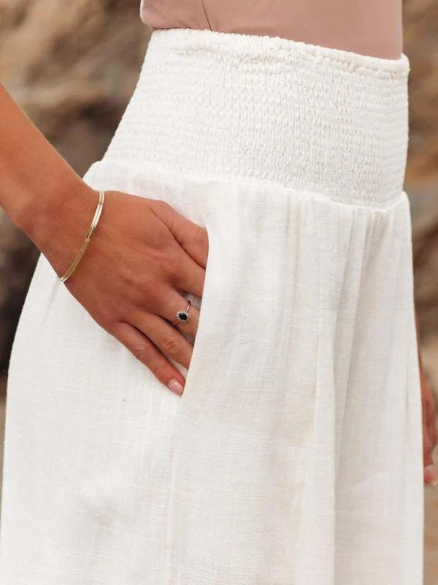 Flowy beach pants for women, showing its side pocket