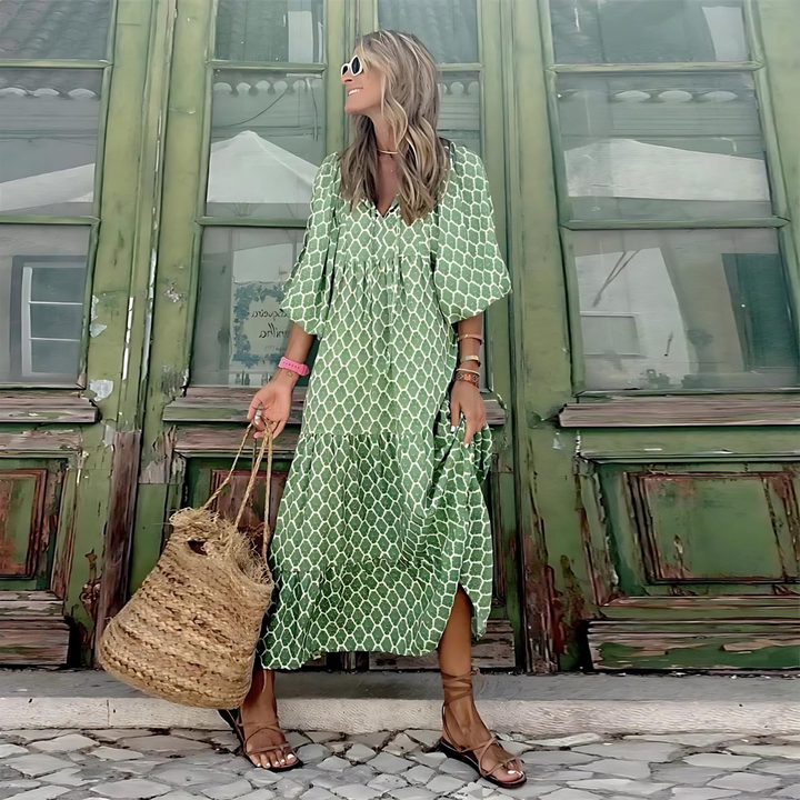 A bold printed dress with a high-low hemline for dinners and gatherings.