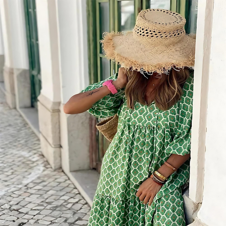 A flowy geometric dress designed for daytime and evening occasions.
