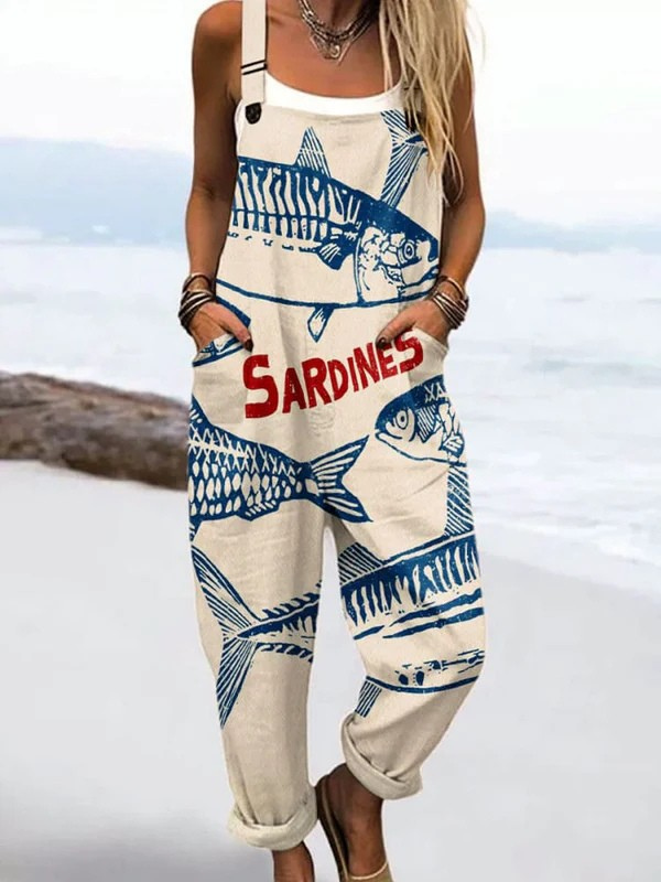 Woman in a relaxed marine-print jumpsuit against a plain background.