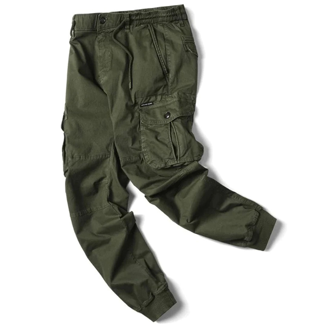 Stylish cargo pants with a streamlined fit on a plain background.