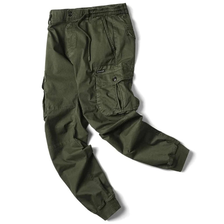 Stylish cargo pants with a streamlined fit on a plain background.