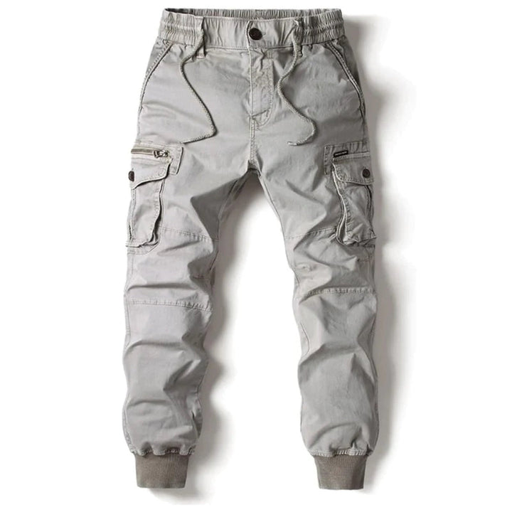 Tapered cargo trousers for everyday styling on a plain background.