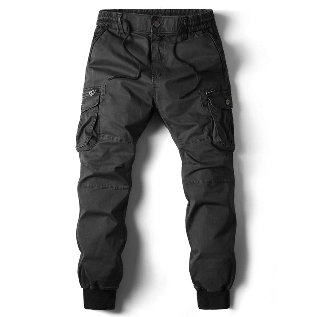 Modern cargo pants on a plain background.