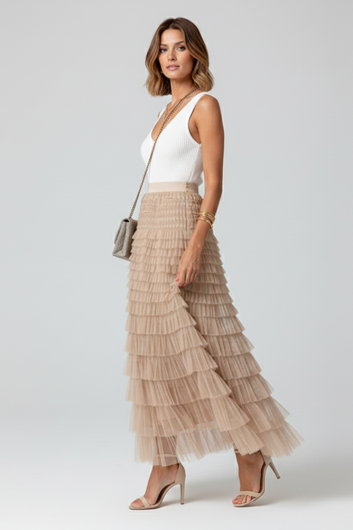 Mid-calf tulle skirt ang white top styled on female model