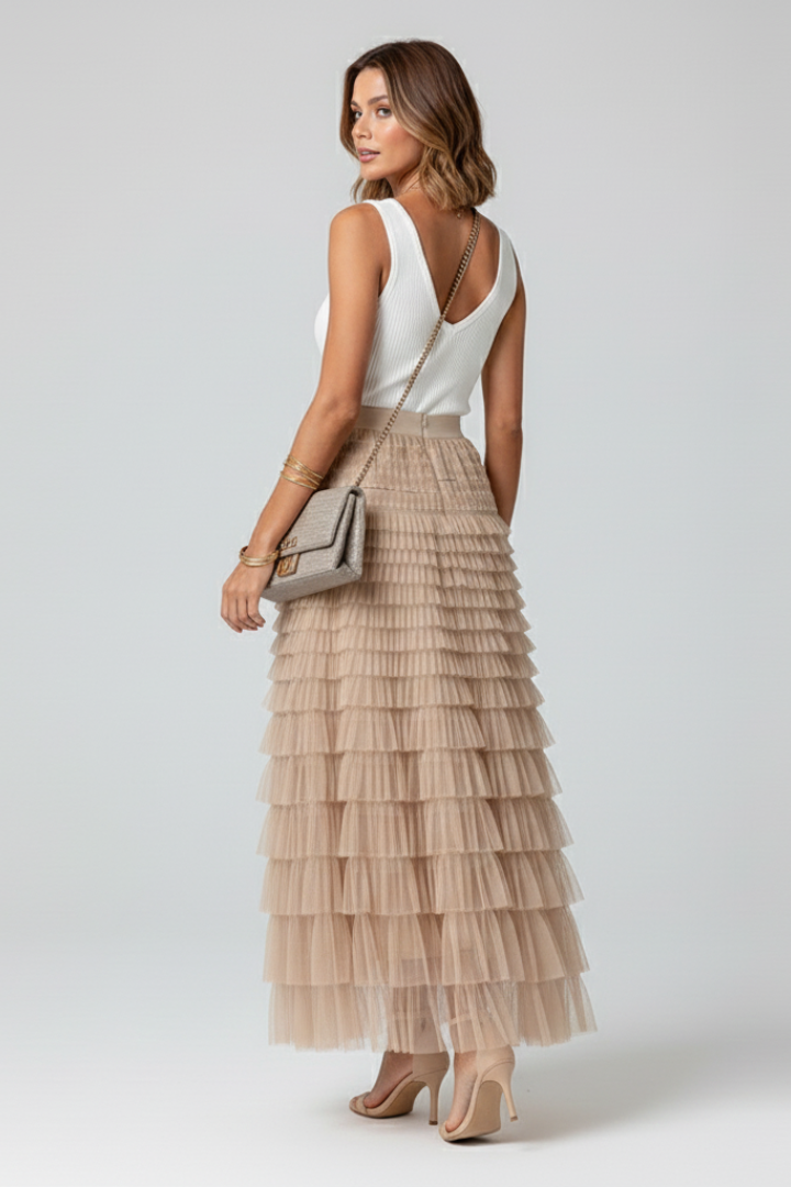 Back view of layered mesh skirt and top  on gray background