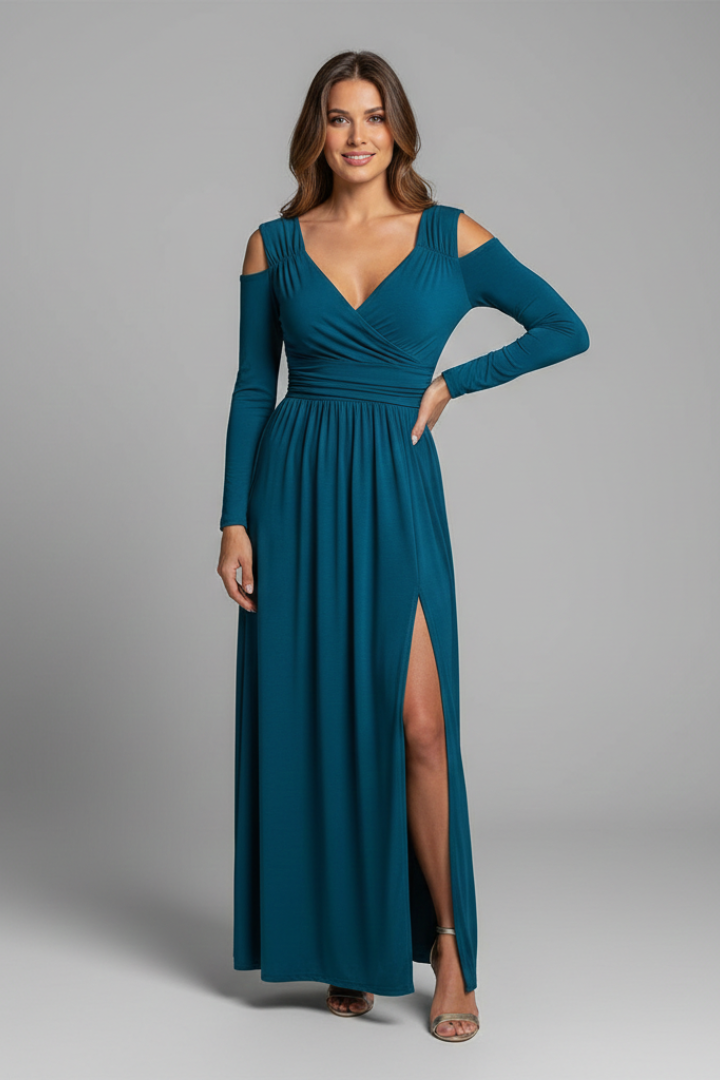 Model posing front way in elegant slit dress, gray background