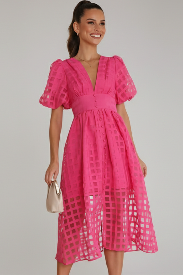 Female model wearing lace midi dress in front view angle