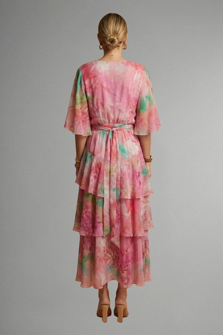 Rear full-length view of elegant printed garment dress