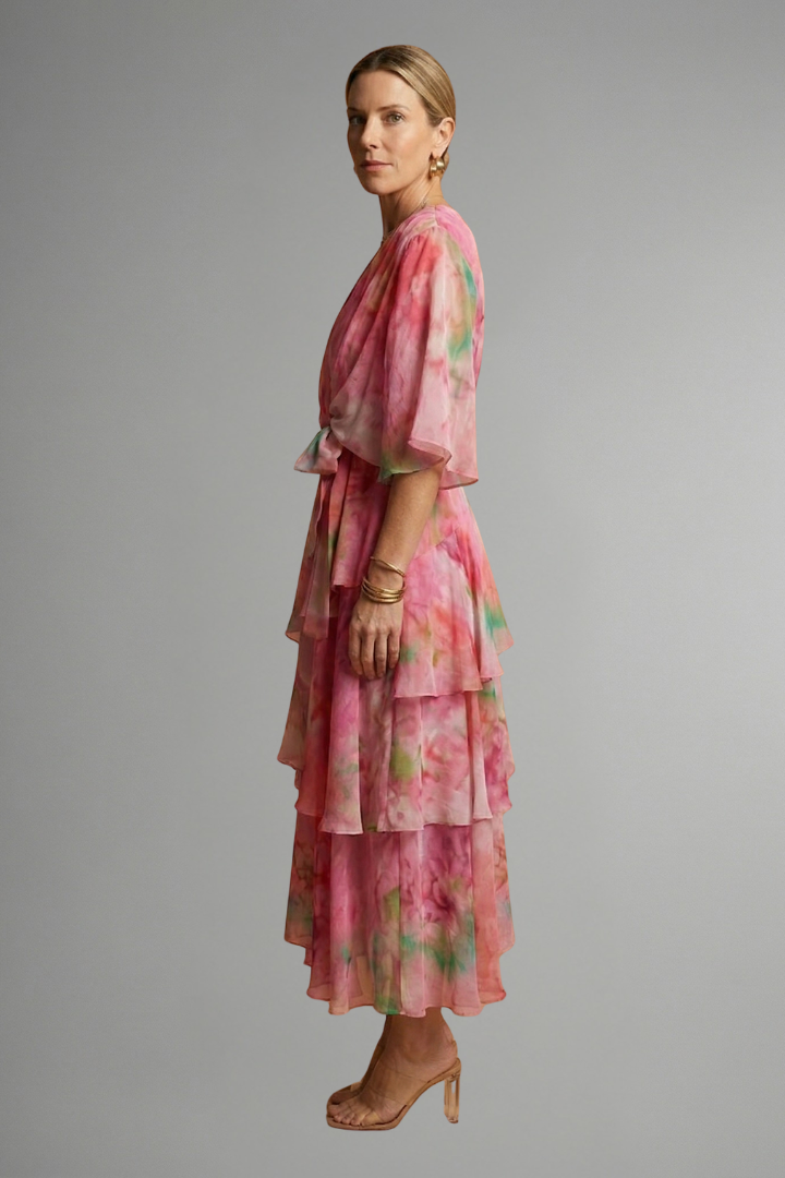 Woman in side angle wearing long sleeve maxi dress 