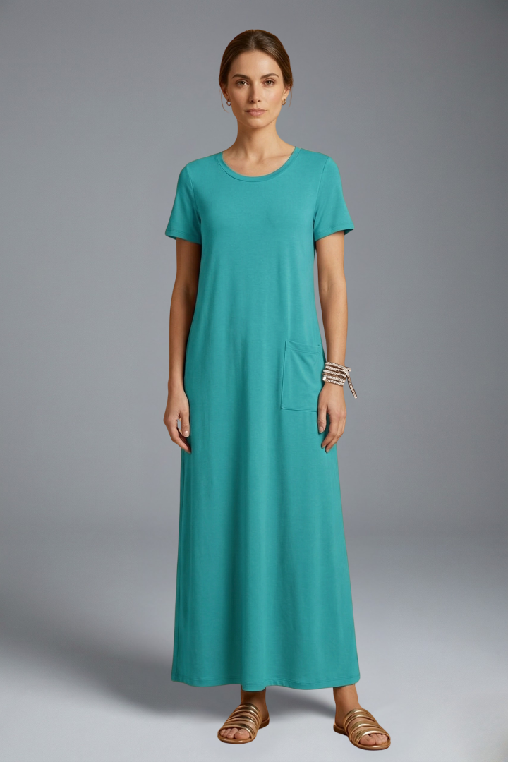 Model wearing casual full-length green dress 