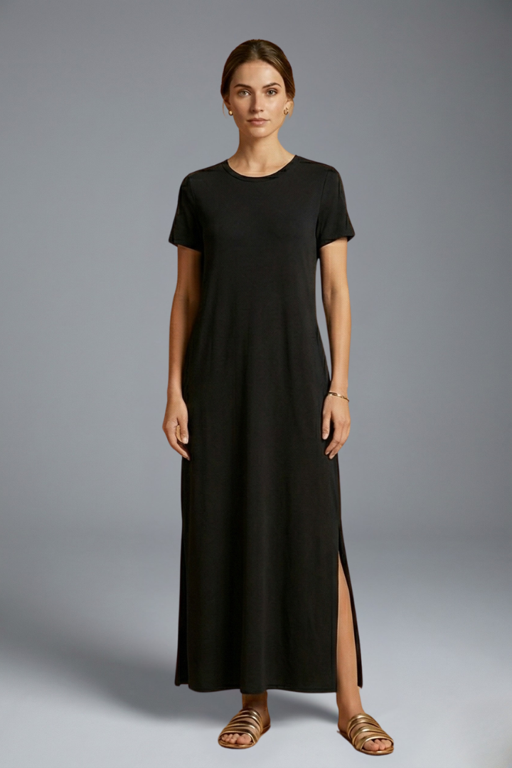 Model straight pose round neck black dress