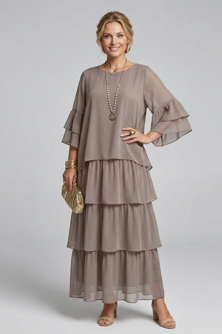 Front close-up of neckline and wide sleeve detail