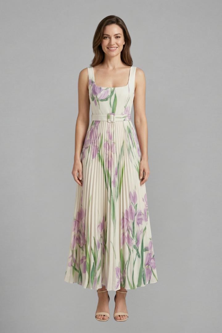 Model wearing floral maxi dress front view gray background