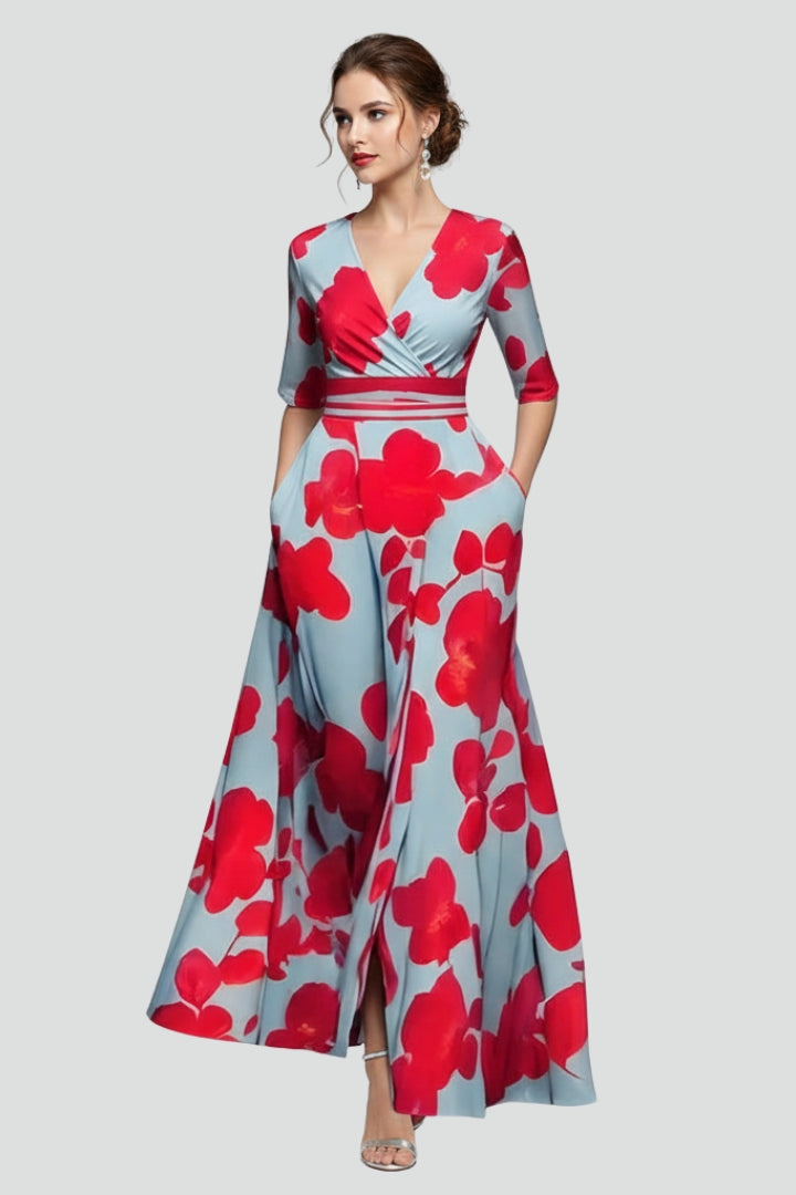 Female model front angle showing flowing dress on gray background