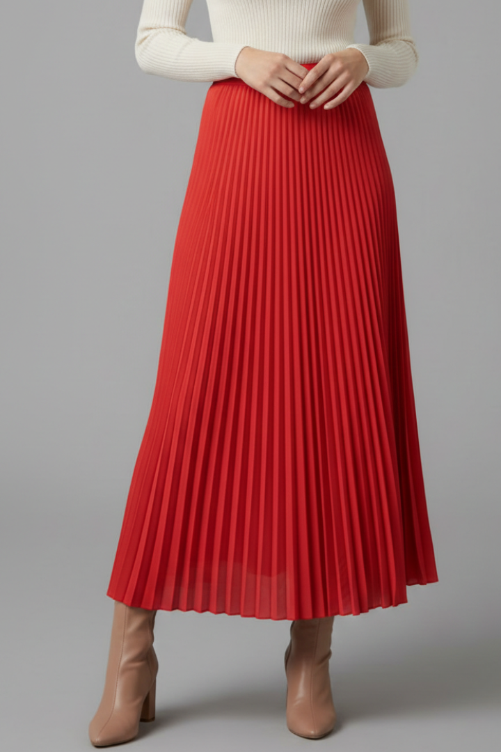 Model wearing a flowing red maxi skirt