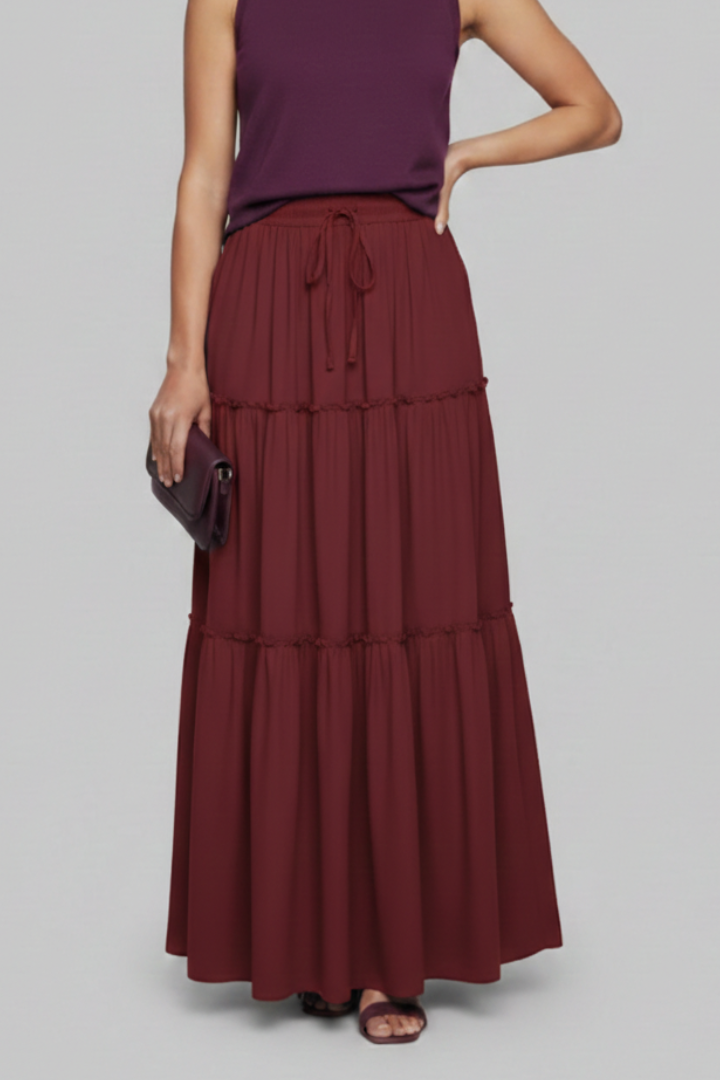 Side pose long skirt studio shot