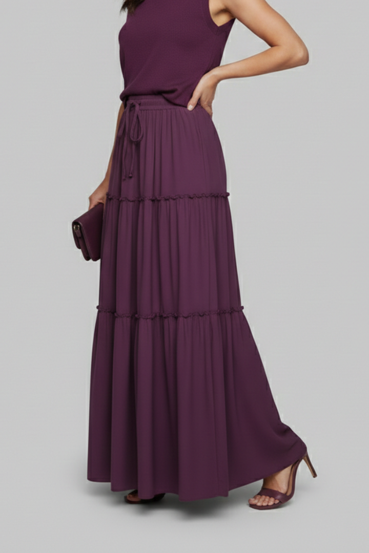 Side view tiered long skirt in gray background