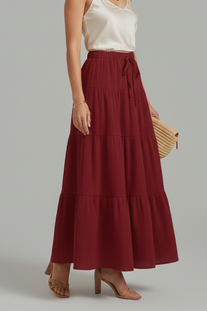 Full length model in woven skirt side angle gray background