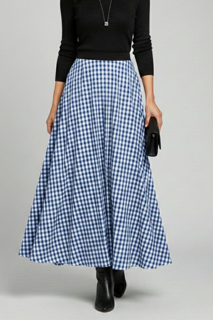 High-waist check skirt styled on female model holding a clutch