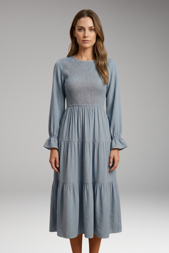 Blue flowy midi dress straight pose gray background
