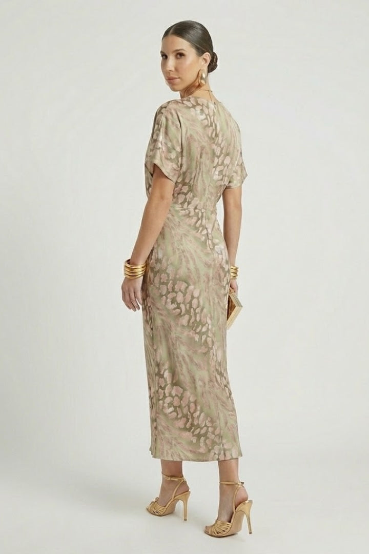 Back view of floral midi dress on model