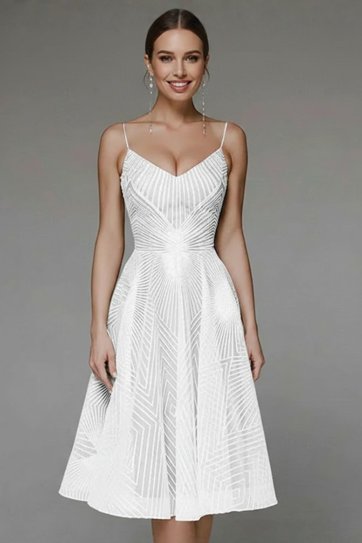 Women’s white formal dress against neutral background