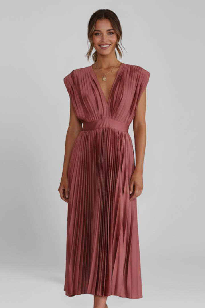 Front angle female model wearing pleated dress 