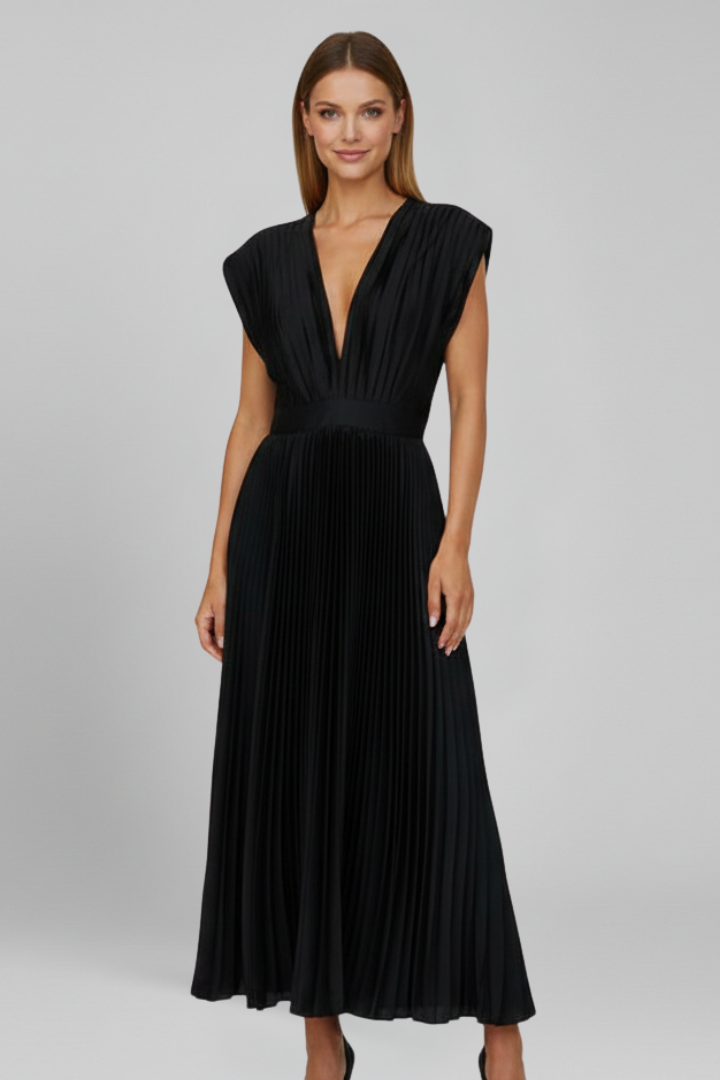 Full body side view of pleated midi dress front view