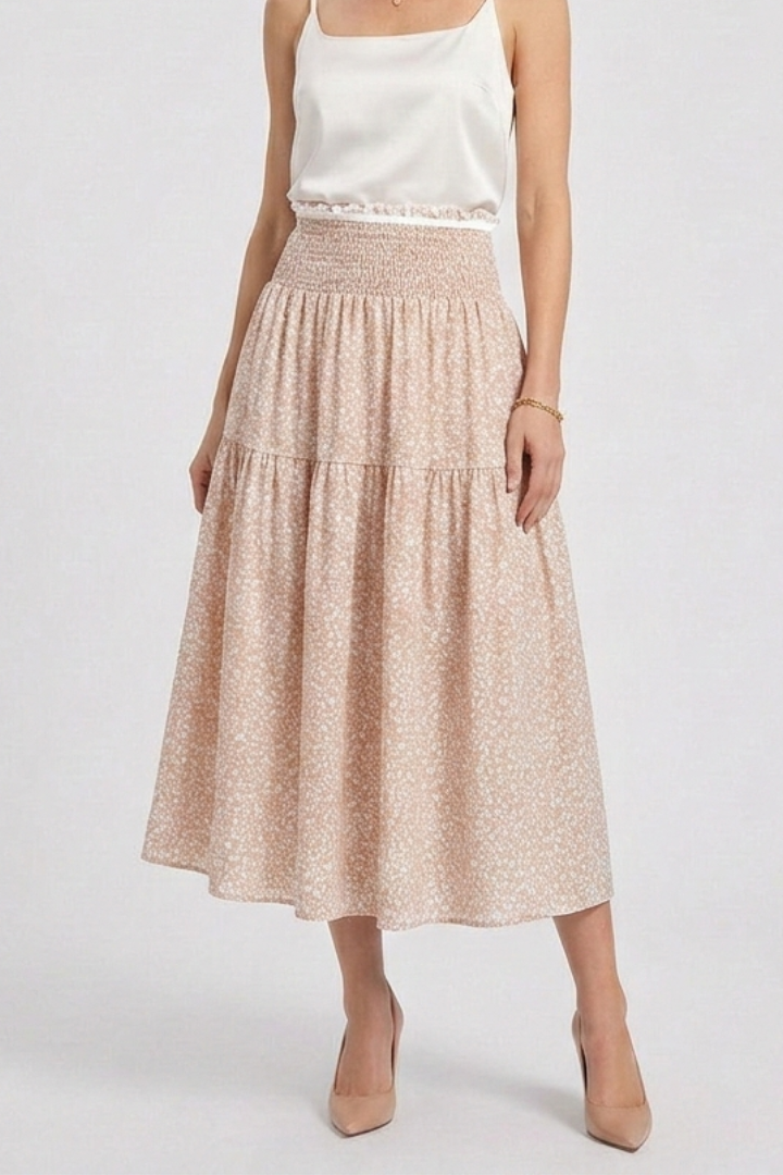 Front-facing floral skirt product image with clean backdrop