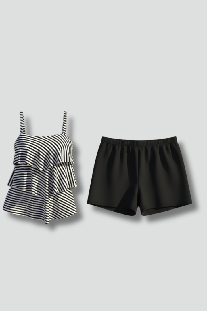 Striped swim top with black short, front view plain gray background