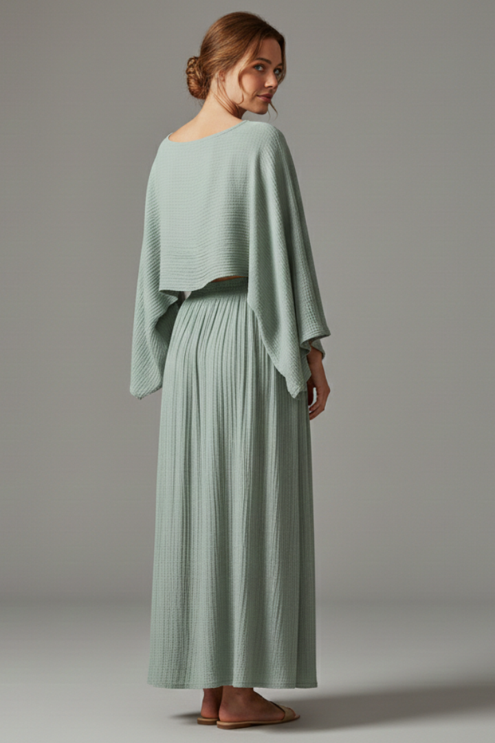 Model back angle textured matching outfit in plain background