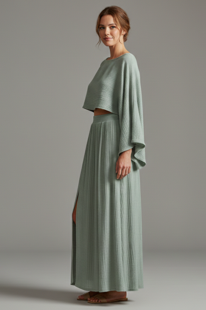 Model wearing a side slit skirt, complete set