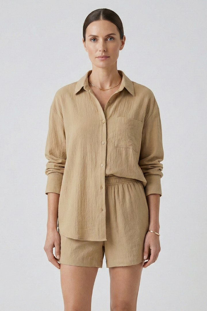 Female model front view wearing matcing khaki set on gray background