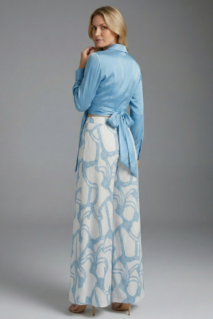 Model back view blue outfit set on plain gray background