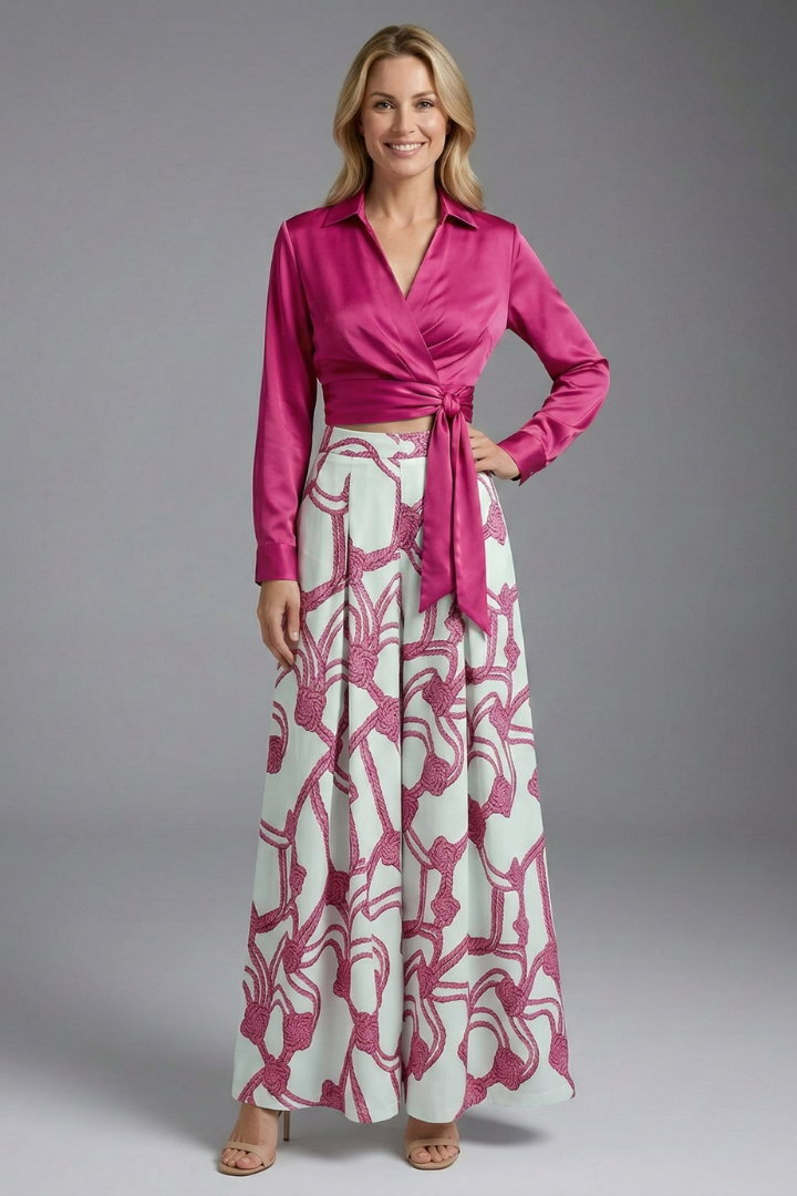 Female model full length pink dress on front view angle, plain background