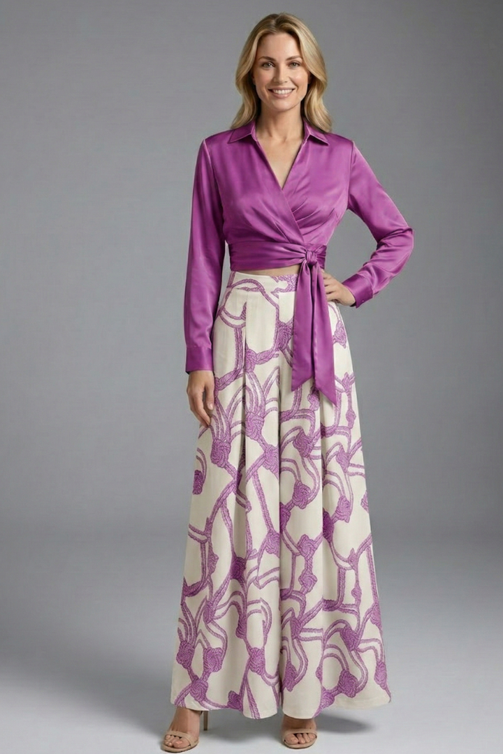 Female model abstract print purple outfit, gray background