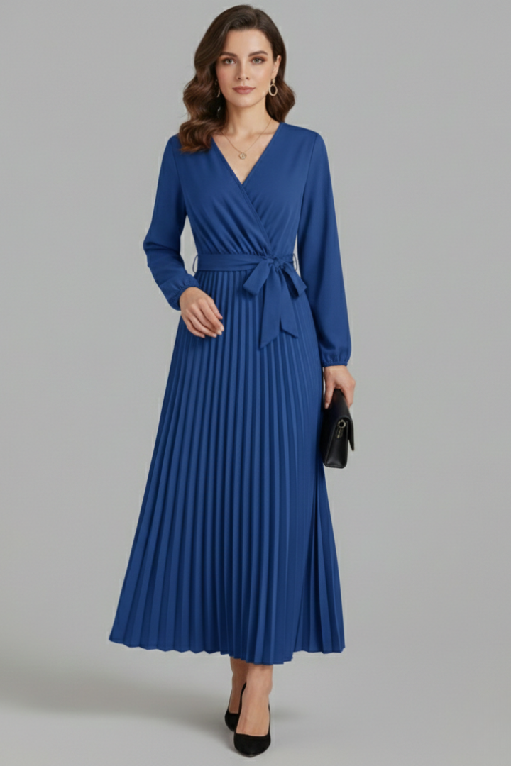 Full length model in blue maxi dress showing soft pleated movement