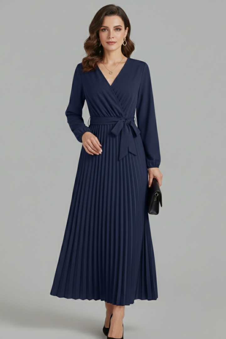 Front studio image of elegant pleated occasion navy dress