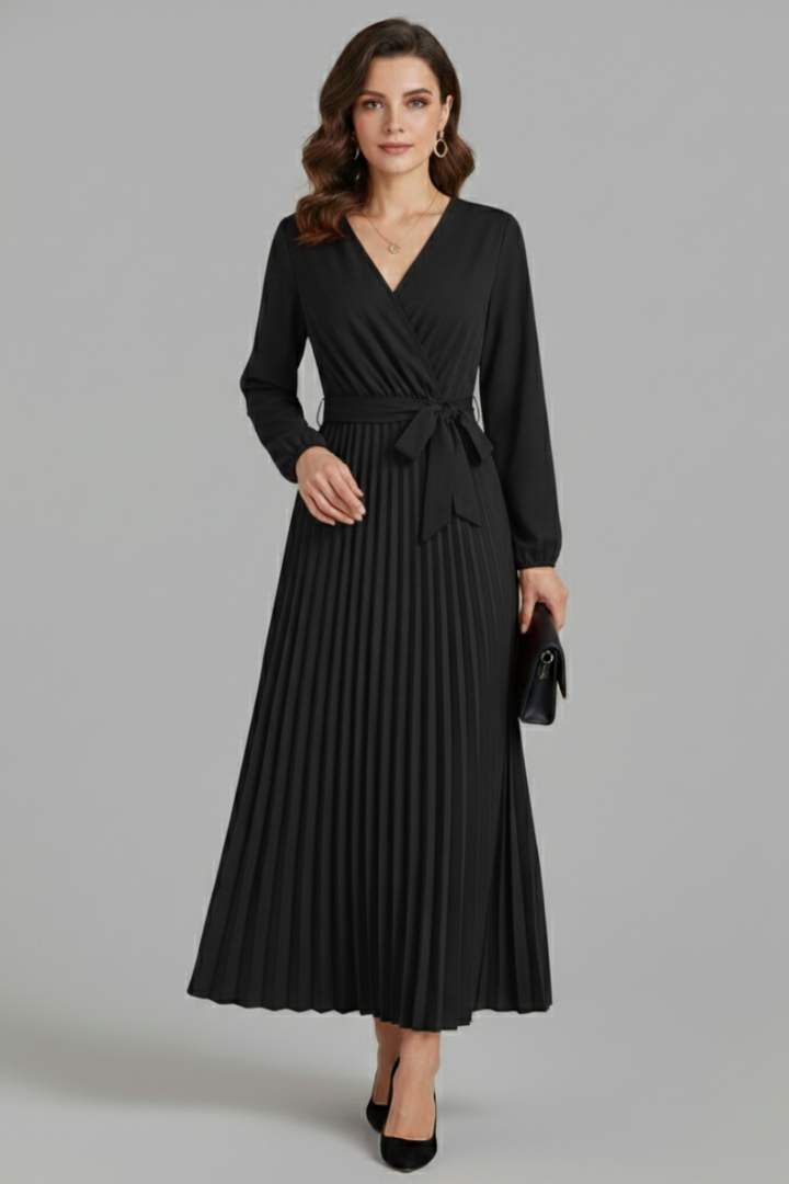 Close up pleated skirt texture on black maxi dress