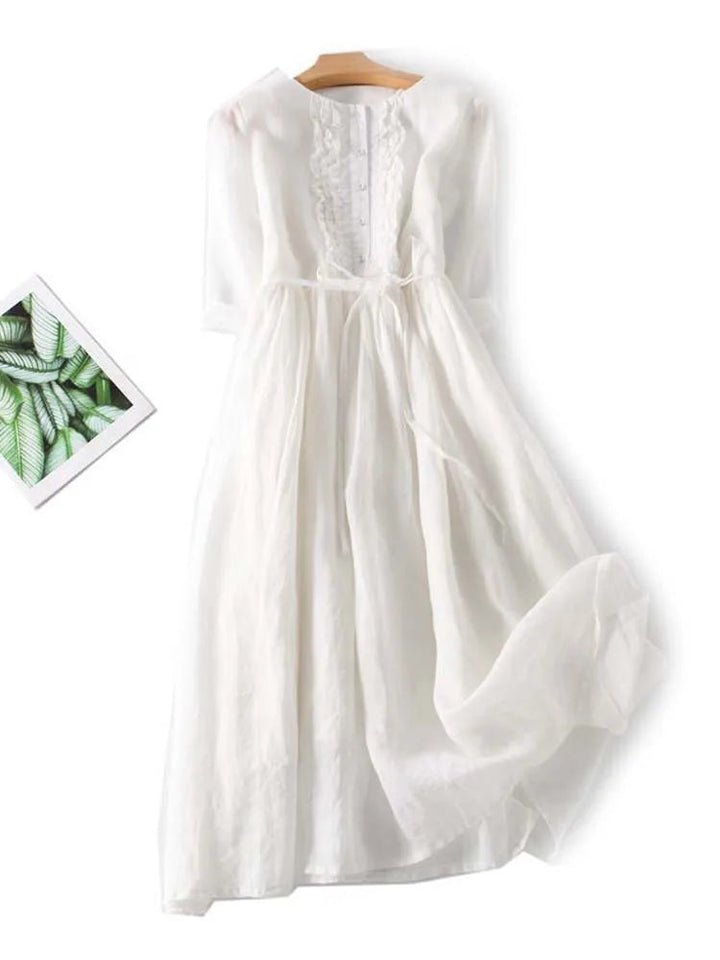 Feminine vintage dress with a breezy design for everyday elegance.