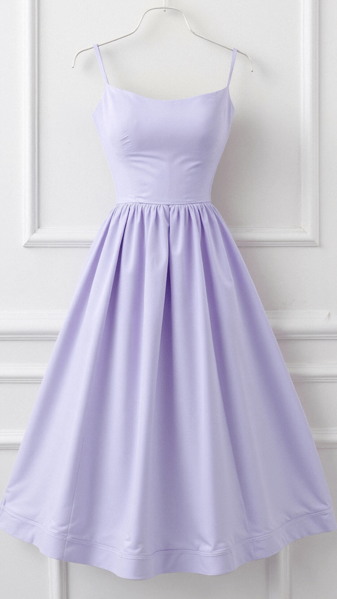  midi-length dress with a flattering flared silhouette against a plain background.