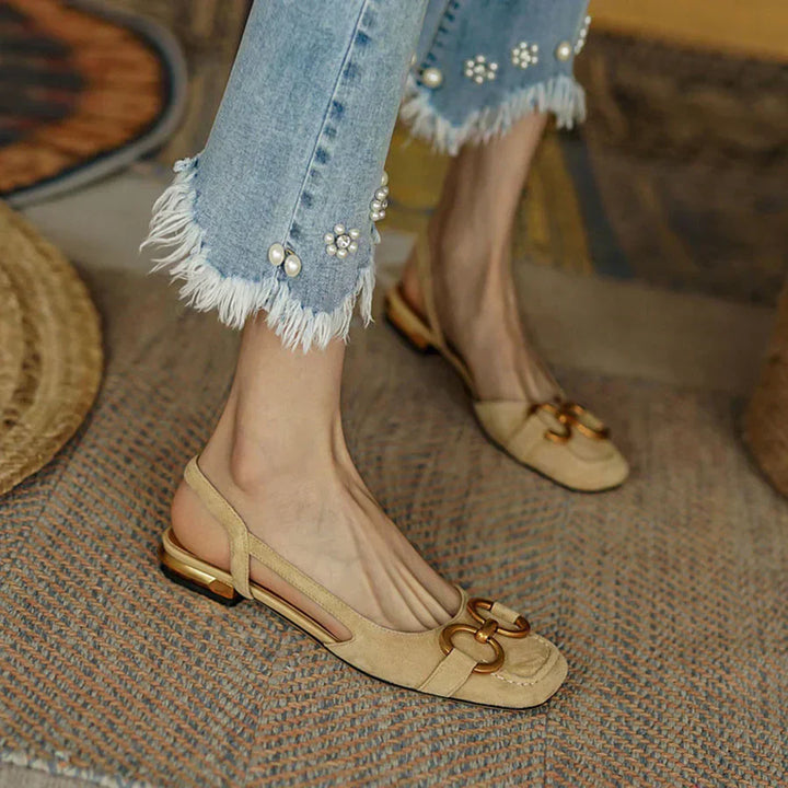 Comfortable women’s sandal designed for daily wear on a plain background.