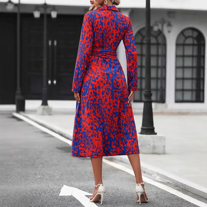 Female wearing a casual midi dress with button-down front and adjustable waist tie, back view angle